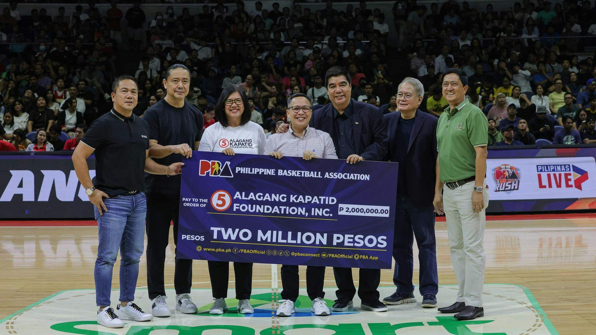 PBA hands over P2-million donation for victims of Severe Tropical Storm Kristine